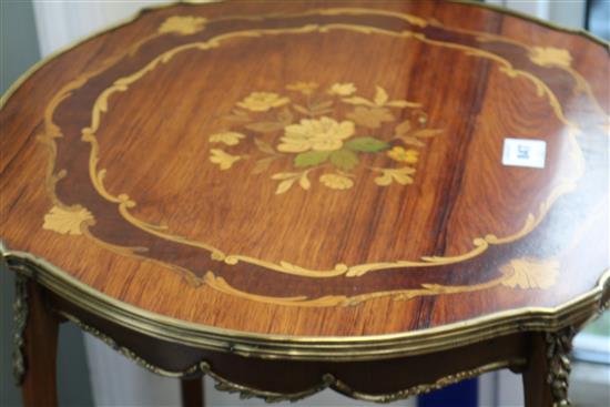 A Louis XV style marquetry inlaid 2 tier table, with gilt metal mounts W.58cm